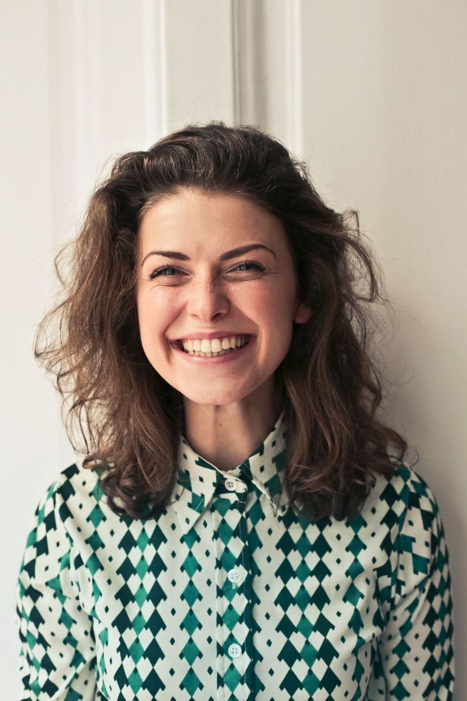 Editorial stock: dimensional brunette cut and style. Not client work.